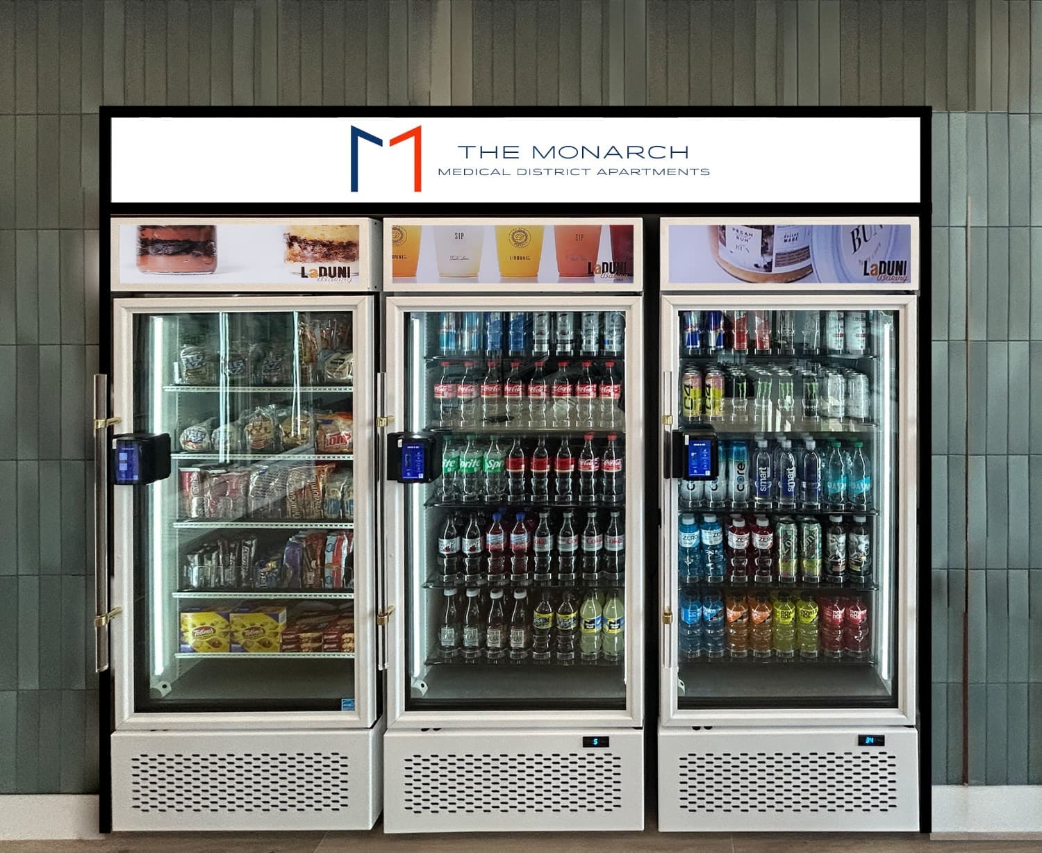 Branded triple-door coolers stocked with snacks, drinks and water in an apartment community